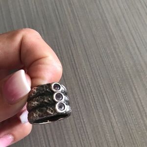Sterling silver ring w/ purple stones